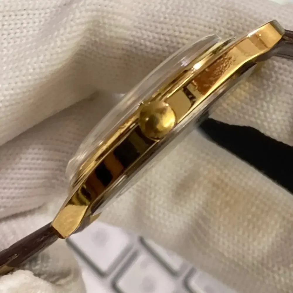 Vintage 1985 Roamer Manual Mens Gold Watch W/Leather Strap & Gold accents
